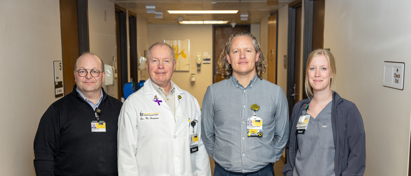 From left, John Stark, Mark Granner, Austin Kannegeiter and Margaret Gassmann in the Neurology Clinic at University of Iowa Hospitals and Clinics on Thursday, Nov. 2, 2023. A proposed expansion would include adding updated exam and treatment rooms as well as staff work space.